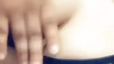 Indian babe's breasts are so big that she can easily lick nipples