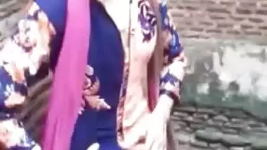 Adorable Desi cutie flashes curious friend her XXX tits in public