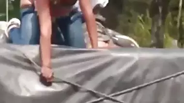 Daring NRI porn of a girl fucking outdoors on a riding truck