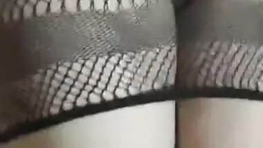 Hot Desi babe in fishnet dress has her pussy XXX rubbed by lover