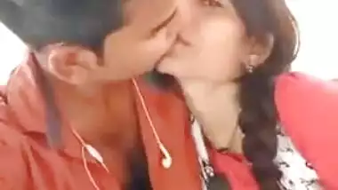 Handsome young man paws Indian's perfect boobs through red dress