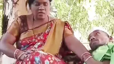 Outdoor sex of a handicapped man with a milf in the jungle